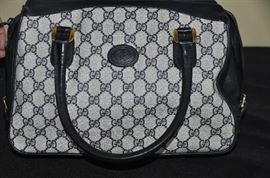 One of two vintage Gucci purses available