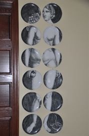 12 Plate Black & White Eva by Fornasetti.  Plates are 10.25" Diameter.  AS IS.
