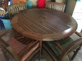 Teak outdoor dining set with 4 chairs & cushions