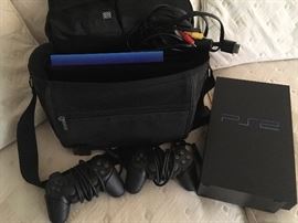 PlayStation2 with two remotes, case & cords