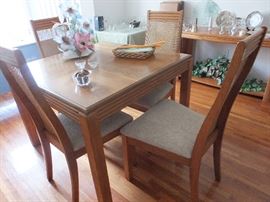 Dining table - at it's smallest size.  Two leafs and 6 chairs with table pads