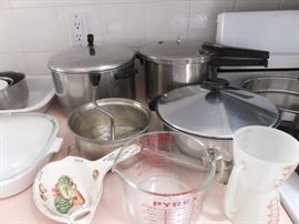 Pressure cooker in back, applesauce maker