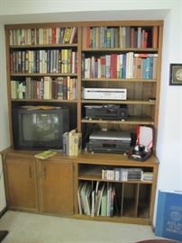 Lots of books and stereo equipment