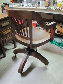 The burled oak desk chair