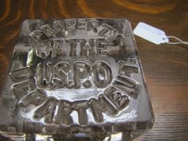 The Inscription on the US Post Office paper weight