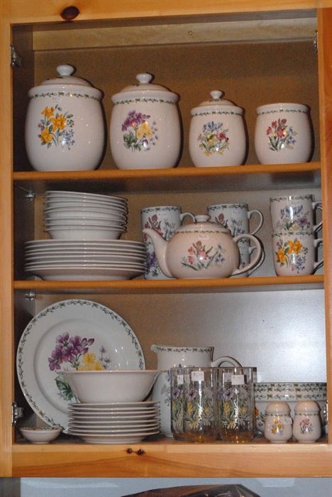 China with flower pattern. Matching canister set.