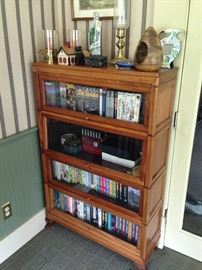 Barrister bookcase housing some of the VHS tape collection