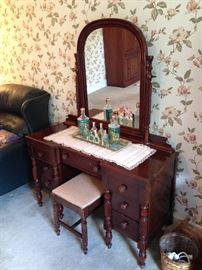 Part of 1940s-50s bedroom suite with vanity and bench, dresser, double bed, bed side table