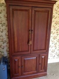 Large modern wood armoire or wardrobe, entertainment center