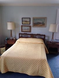 One of four full bed room suites. This one includes queen bed, two bedside tables, dresser and dresser with mirror.  New Mexico paintings by Nona Walker and Margaret Osment, lamps