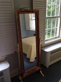 Gilt full length mirror in stand