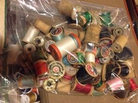 Wooden spoons, sewing notions, pinking shears...a vintage sewing cabinet, sewing baskets, pin cushions