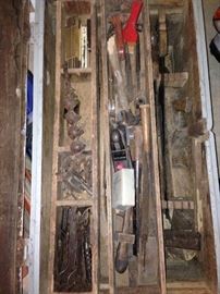 Large antique tool chest full of old tools, including handmade planes