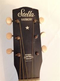 Stella Harmony Guitar with case. Also box of sheet music!