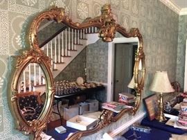 Huge decorator mirror in foyer. Be prepared to have multiple people help take it down and carry it!