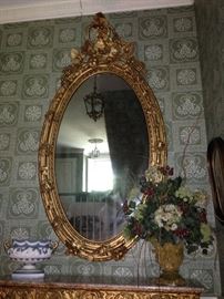 Grand 4 foot plus tall oval mirror on the stair case. Monumental.Rare chance to own a mirror fit for Rippavilla, Belle Meade or Belmont!  Be prepared to have multiple people present to take down mirror and transport it.