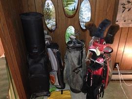 Assorted golf clubs, two child's sets