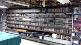Collection of music, cd's, vinyl, cassette tapes, blank cd's, cassette storage, American Flag, Wood boxes for cassette storage.  Led Zeppelin, Sinatra, Steve Winwood, Temptations, Elvis, The Who, Gone with the Wind VHS, Sopranos, Star Trek, R&B....amazing collection...and more