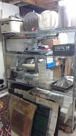 Roasting pan, commercial pizza pans, plastic container, toaster, hot cheez server, insulated green zippered delivery containers, rolling pin, large pot, lids, pans, Star electric heater.....much more
