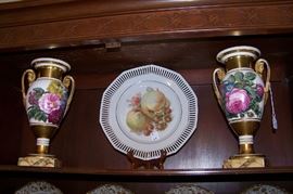 Pair of beautiful urns - gold is in excellent condition. These can be turned around to show a different design (shown in next picture)