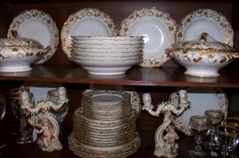 Beautiful partial set of china -several sizes of plates, large bowls, and covered tureens. Unfortunately, there are no cups and saucers - early pattern, which is unknown