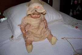 Love this little thing - she has on her original clothing and shoes and socks
