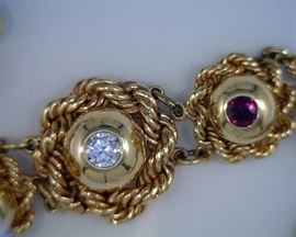 14K gold bracelet with rubies and diamond