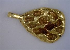 Gold nugget, 14K. This side 'appears' to have stones - it doesn't