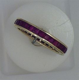14K band with square cut ruby stones