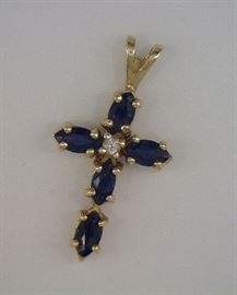 14K gold and sapphire cross, tiny center diamond