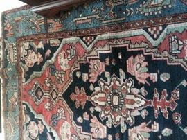 Note the beautiful aqua coloring around the edges as well as sprinkled through the center of the rug