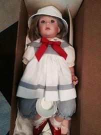 I have to tell this story - my granddaughter was about a year old. We were at the Doll Shop on Mulberry looking for a doll - went upstairs and both her mother and I stopped immediately and were stunned! This doll looked exactly like Nicole - we had to have her! Here she is in the original box - never out of it - beautiful little doll!