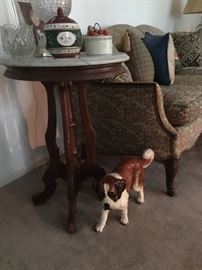 Marble topped parlor lamp table, sofa side view