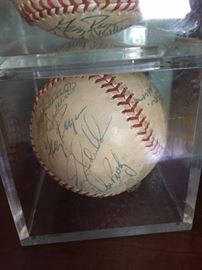 This is the second baseball autographed by the Chicago White Sox 1980's players. Includes plastic case. (2 total) $100 each or both for $150