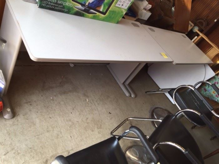 L shaped Desk with 2 corner pieces $80 has outlet holes for cords on top.
