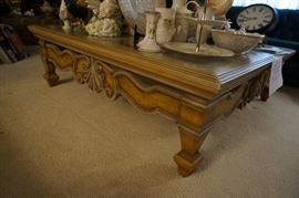 Great glass and carved wood coffee table