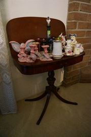 Antique side table.  Tons of figurines