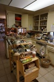 Loaded kitchen with all manner of cooking supplies