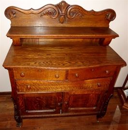 ANTIQUE CARVED TIGER OAK CLAW FEET SIDEBOARD 