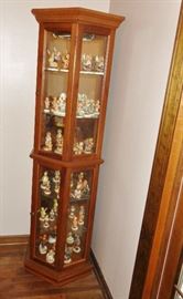 LIGHTED MIRROR BACK CURIO CABINET FILLED WITH HUMMELS