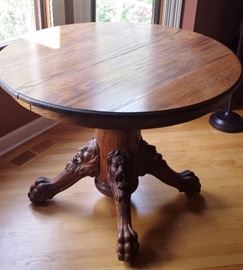 ORNATELY CARVED LION HEADS CLAW FEET OAK PEDESTAL TABLE