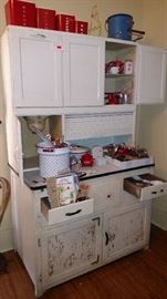 vintage kitchen cabinet, canister set, red wood handle kitchen beaters, openers,etc