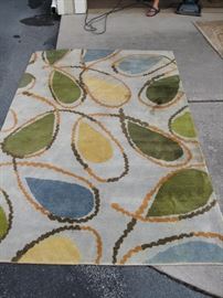 Attractive contemporary rug, has some staining