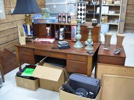 Dell desktop computer, various decorative items. Office desk