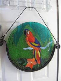 Large art glass in car iron stand