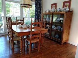 Antique oak dining table and six ladder back side chairs