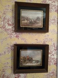 Pair of prints in reverse painted frames
