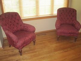 Pair of button back armchairs.