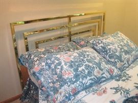 Contemporary queen size brass bed.