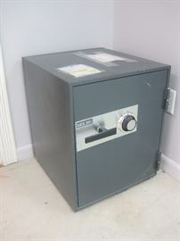 Metal safe with combination.
